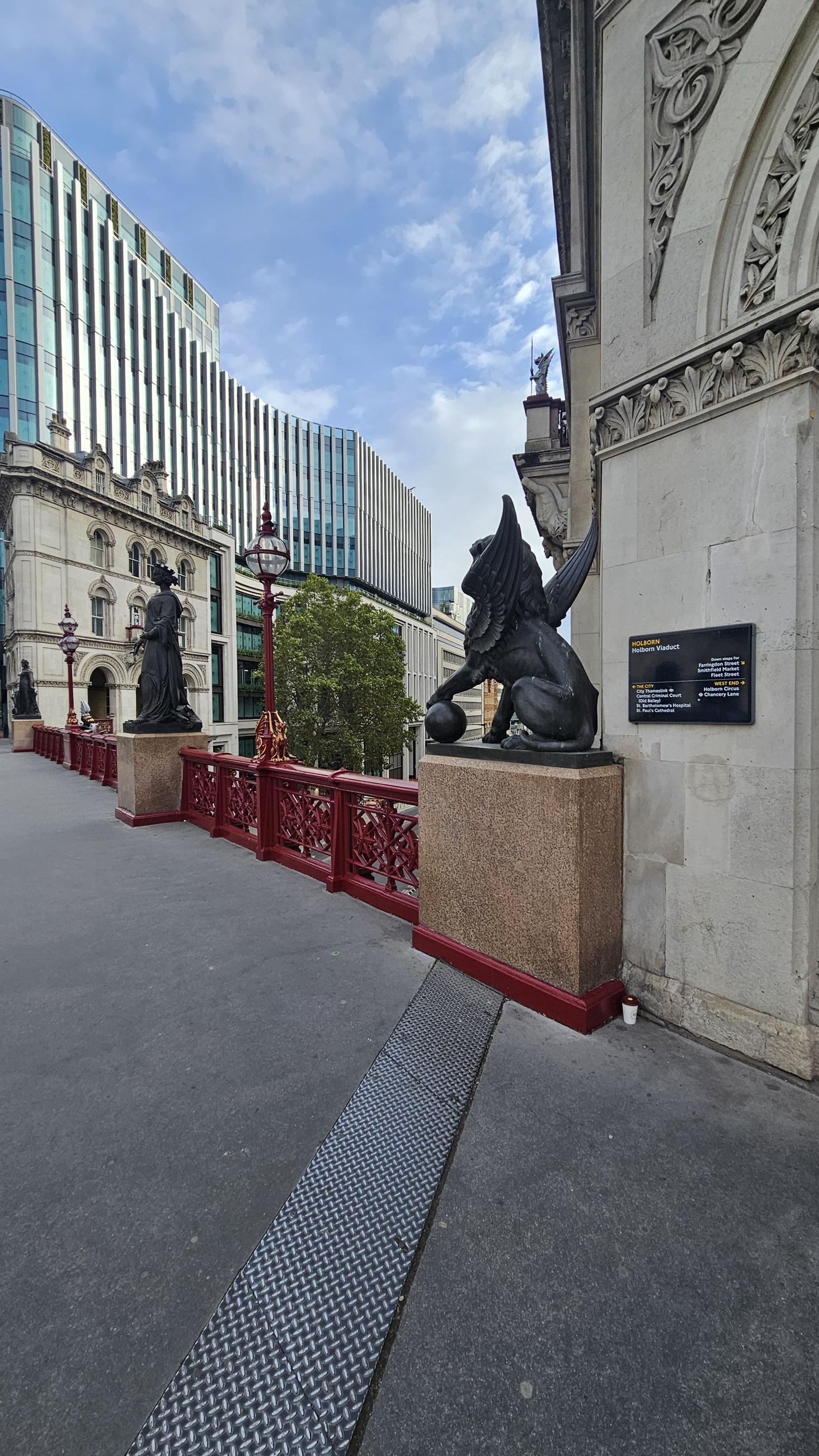 A winged sculpture beside Holborn Viaduct